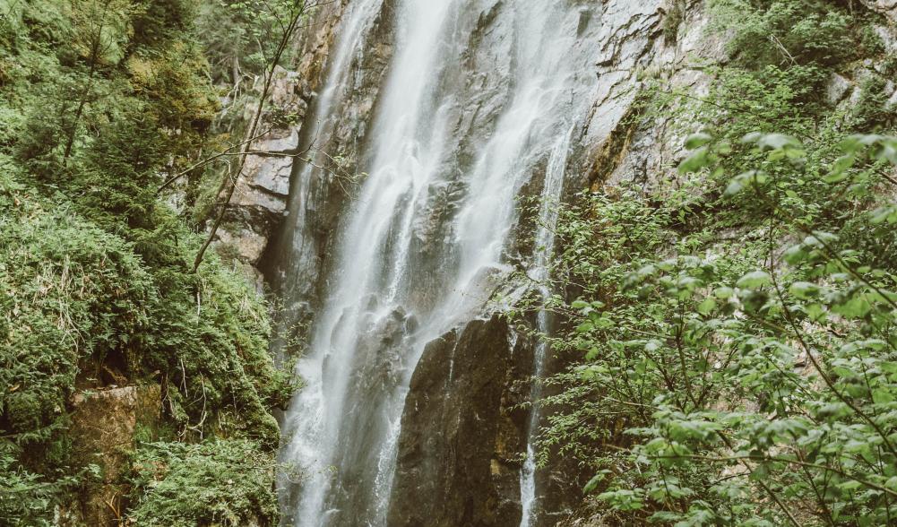 Photograph of a beautiful waterfall cascading down a mountainside in the Adirondacks in spring