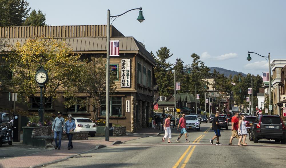 People walking along Main Street Lake Placid