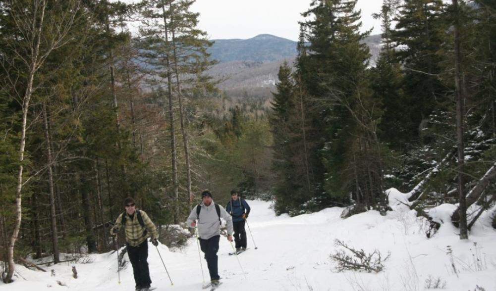 Skiers enjoying the varied terrain at Cascade Ski Center