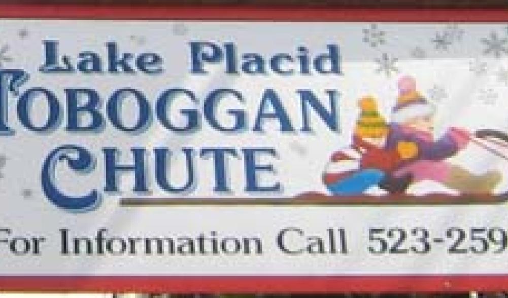 Sign with drawn graphic on Lake Placid Toboggan Chute