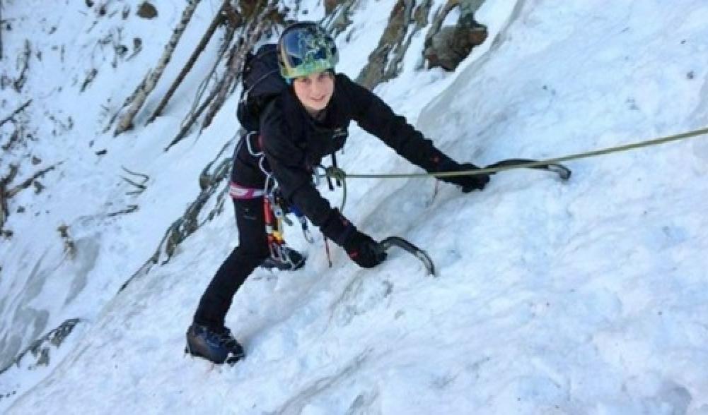 Girl Ice Climbing