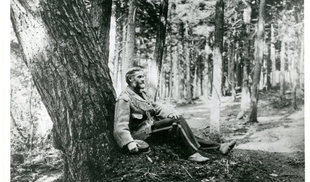 Van Hoevenberg at base of tree c. 1900-1905