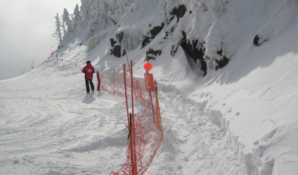 Slides open to skiers and riders with beacons and shovels