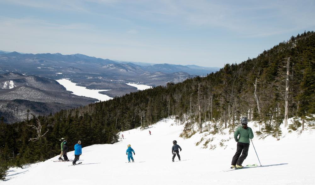 A family with small children ski at Whiteface.