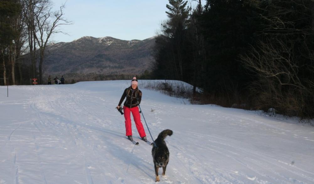 Getting a helpful pull on the way to the Lake Placid Pub and Brewery on the Jackrabbit Trail