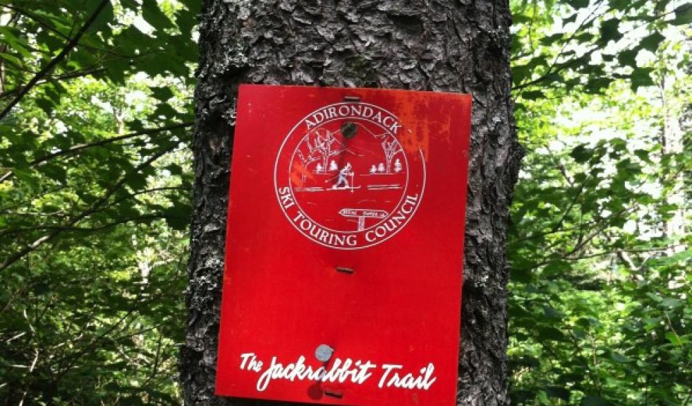 A Jackrabbit Trail marker from a warmer season