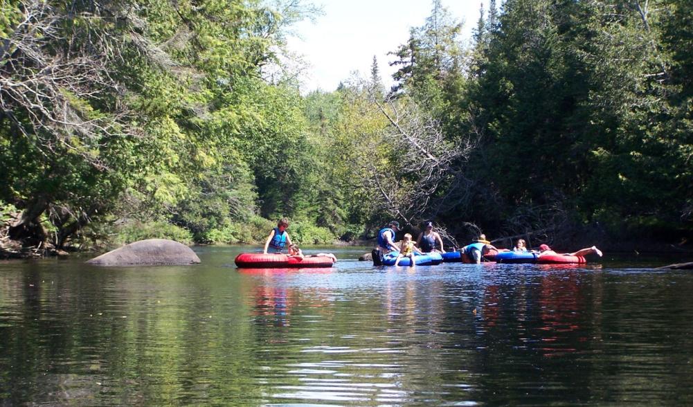 Floating along the upper reaches of the Hudson River near Newcomb.