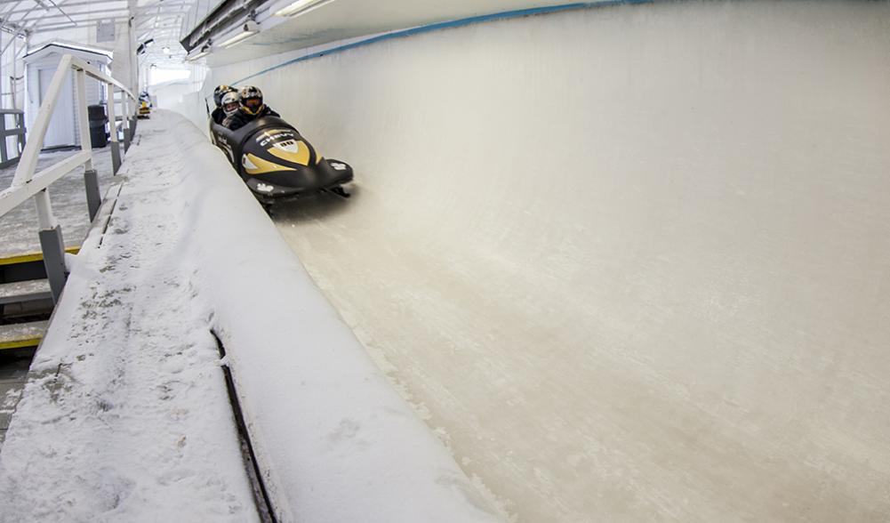Bobsled passenger ride coming down the track