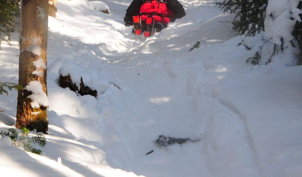 Butt-sliding down the trail!