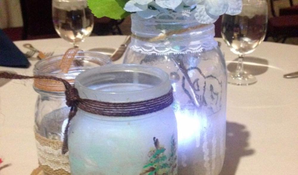 Homemade Adirondack style centerpieces on every table
