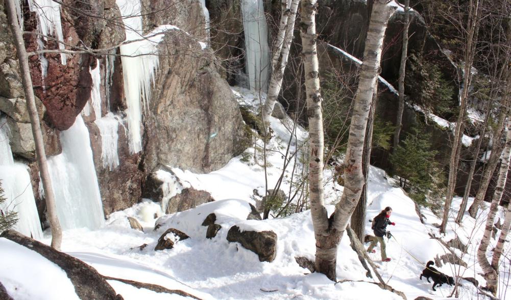 Anna and Belle descend Mount Jo via the long trail, one of the best Adirondack winter hikes.