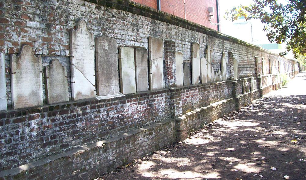 Brick wall with headstones in Colonial Park Cemetery