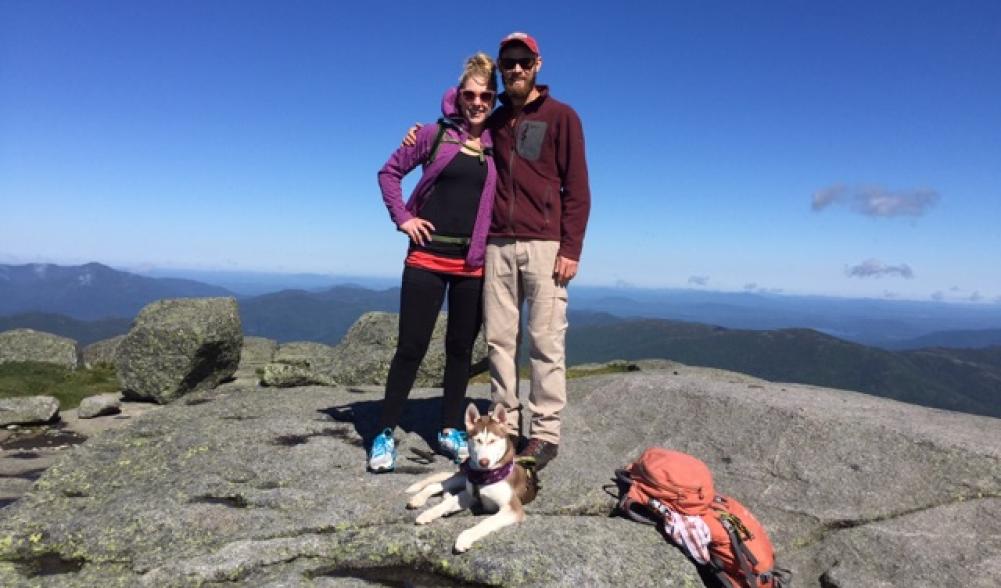 Proud parents at the summit of Algonquin Mountain with Shoka.