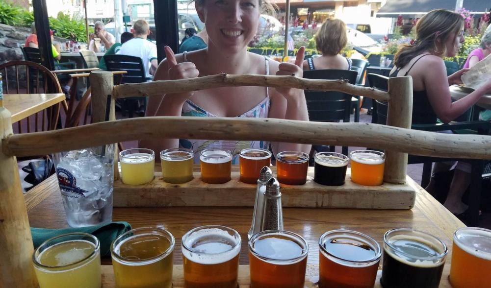 My cousin, Molly, excited to try her beer flight!
