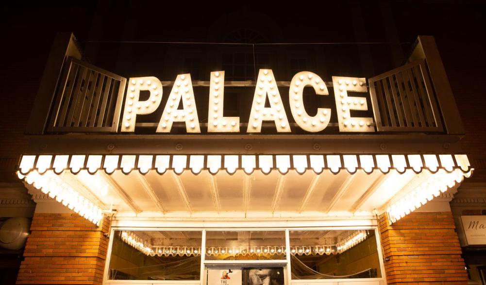 Nighttime view of the entrance of Palace Theater, Lake Placid's movie theater