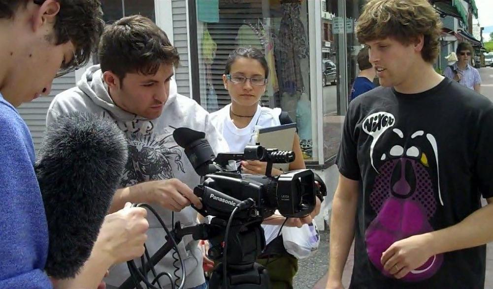 Student film crew working.