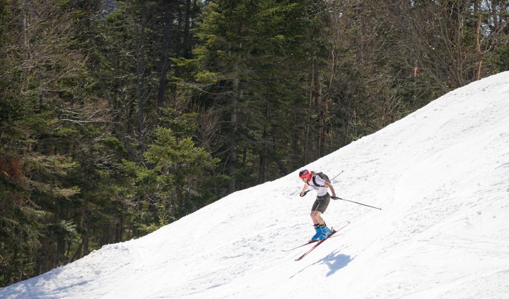 Skiier in shorts skiing at Whiteface Mountain