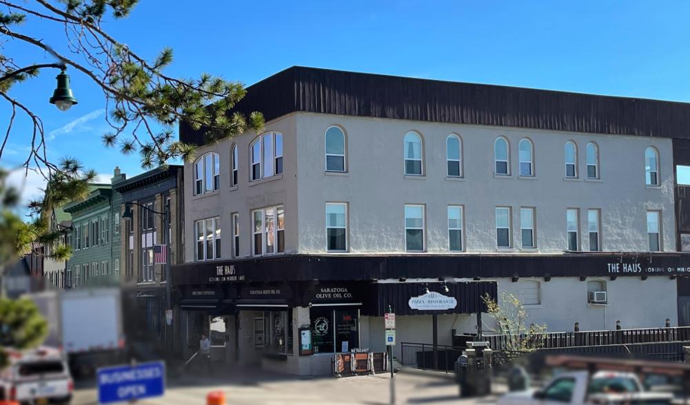 Exterior photo of the Merriam building on Lake Placid's Main Street.