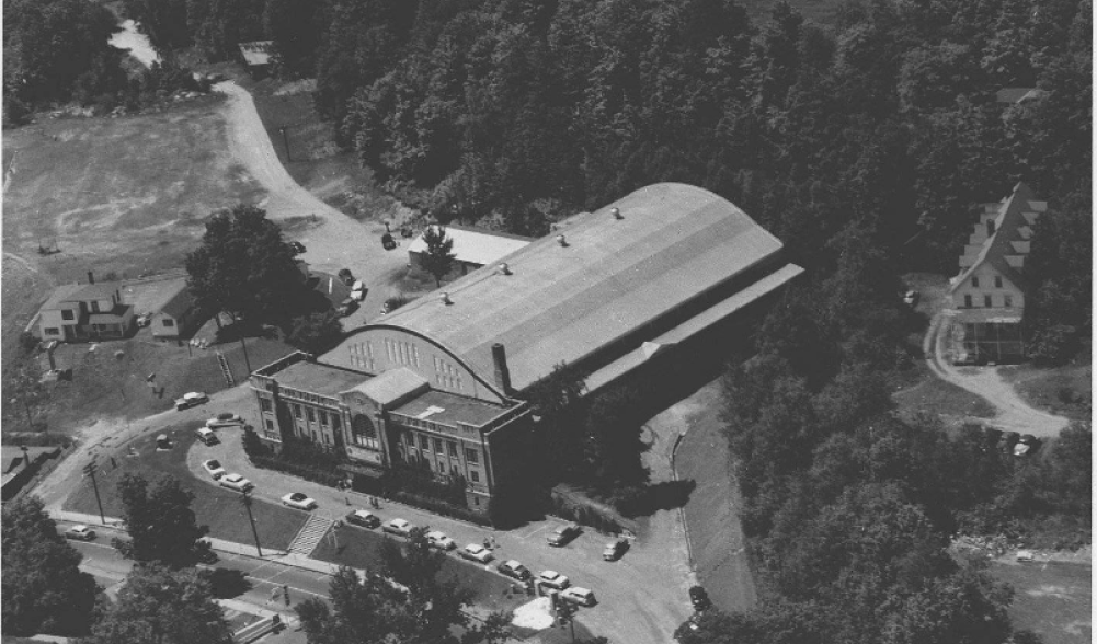 A black and white aerial view of the 1932 Olympic arena, circa 1950. Image courtesy Lake Placid Public Library.