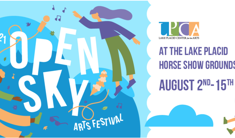 A sign for the Open Sky Arts Festival announces dates