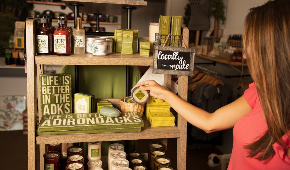 A woman shops for locally made Adirondack products