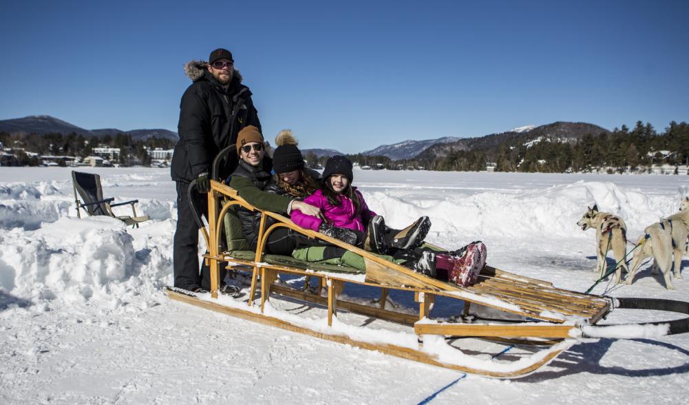 Dog sled ride with a family