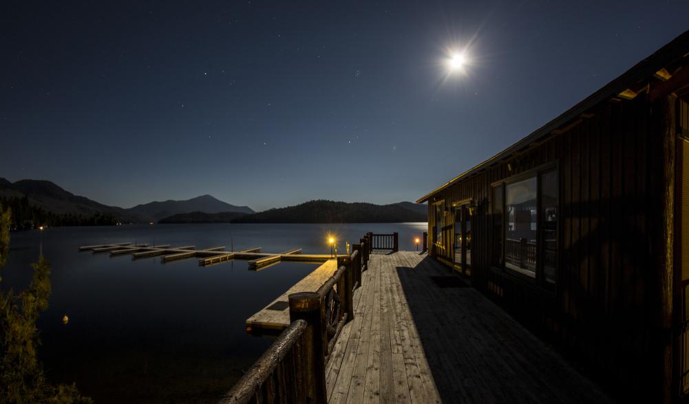 Whiteface Club dock on the water during a full moon.