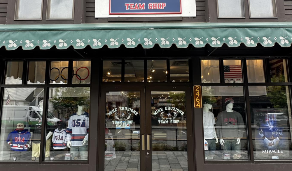 The storefront display of Mike Eruzione Team Shop on Main Street, Lake Placid
