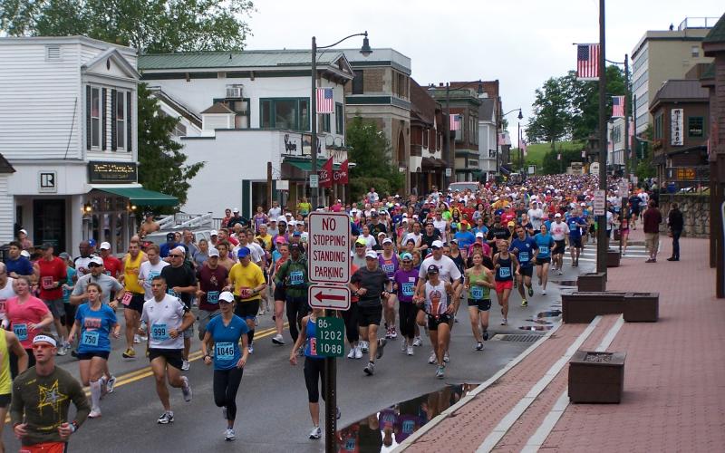 Lake Placid Main Street is packed with runners