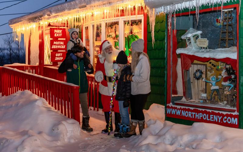 Village of Lights family with Santa