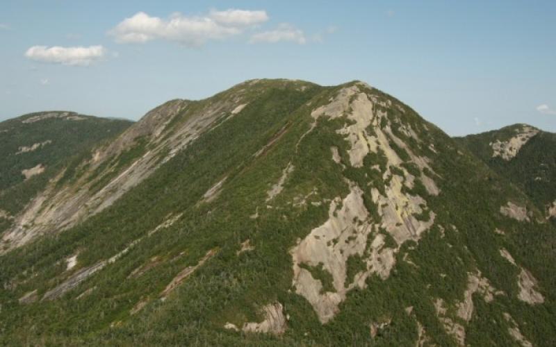 These massive slabs of rock are known as the Great Range of the Adirondacks.