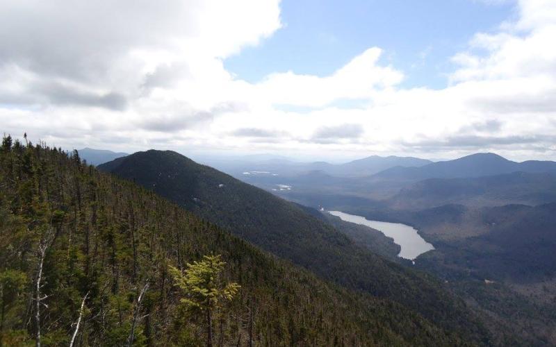 See Lower Ausable Lake from the summit of Mount Colvin.