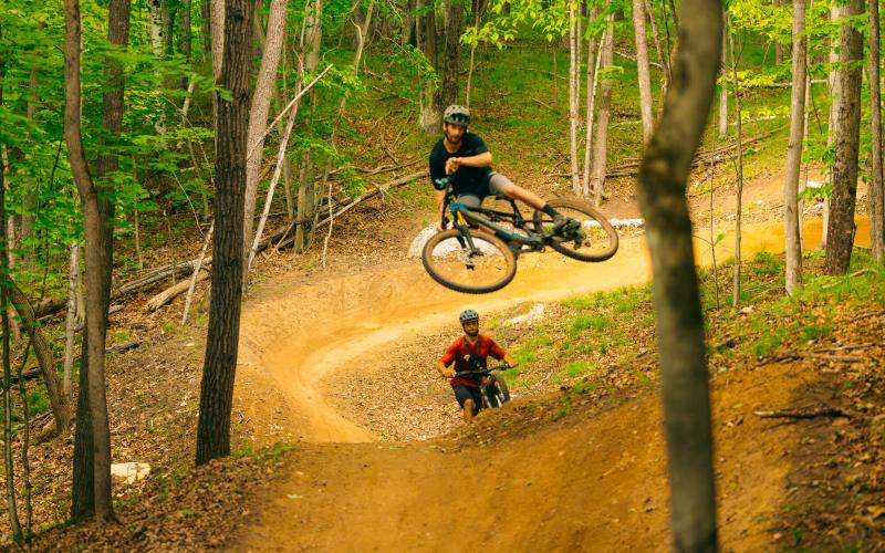 A mountain biker gets big air