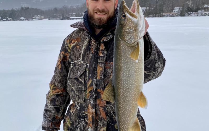 Man with large Great Northern Pike