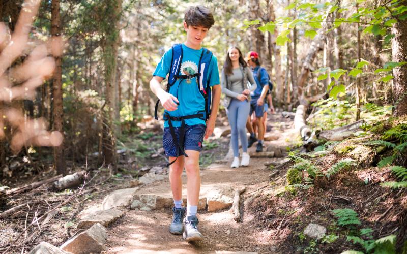Kids hike up the Mt Van Hoevenberg East Trail