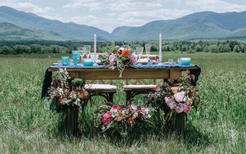 The Sweetheart table adorned with flowers